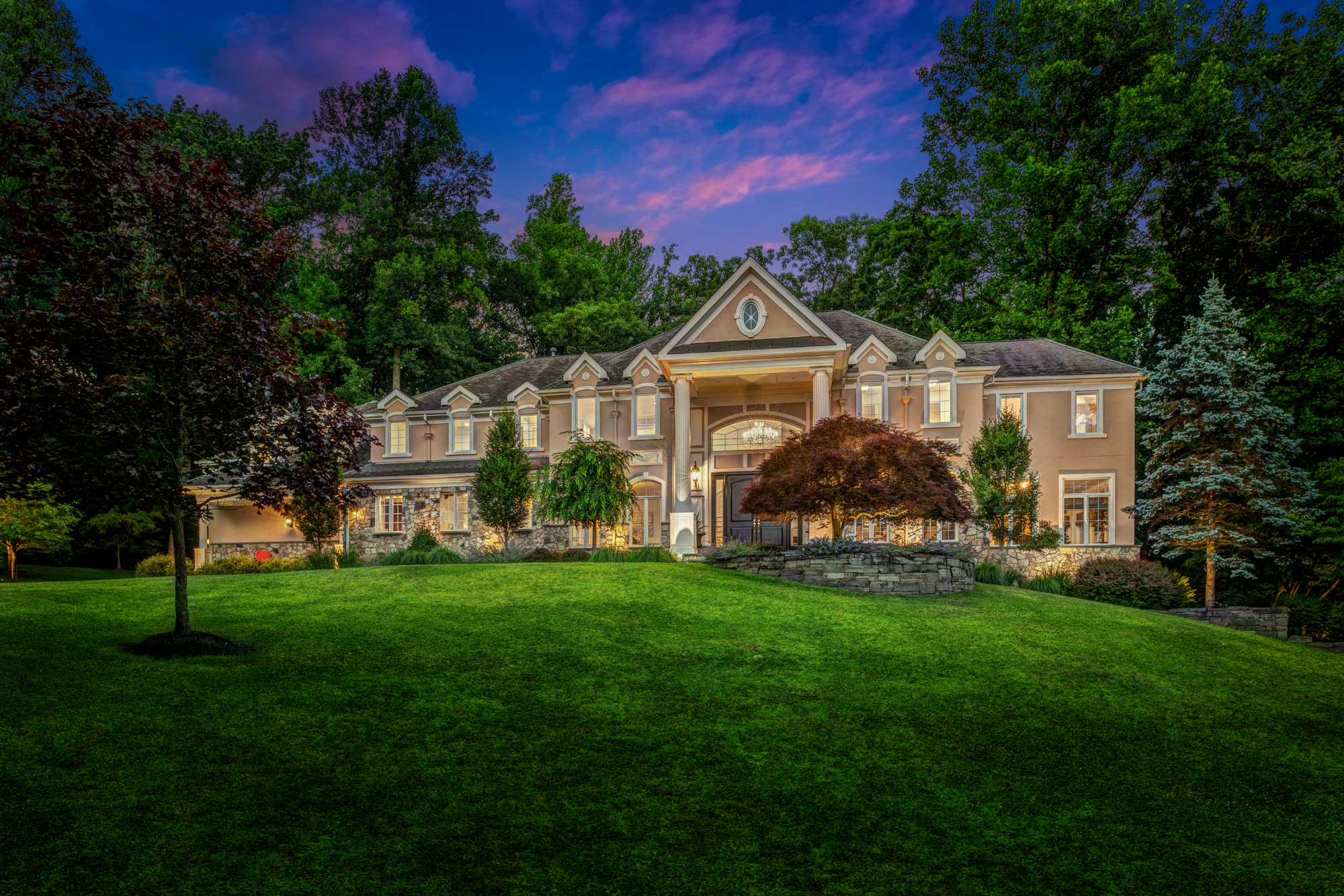 Luxury home photographed at twilight